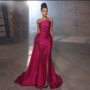 Beautiful duchess satin evening gown in Fuchsia colour with diamond embellishments